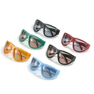 Futuristic cyberpunk Y2K wrap around oversized sunglasses in multiple vibrant colors