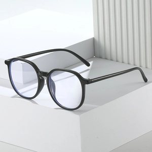 Modern black TR90 square frame blue light blocking glasses on a white geometric background