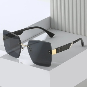 Modern rimless square sunglasses with grey lenses and gold D-shaped metal hinges