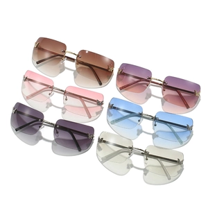 Frameless Y2K sunglasses with butterfly diamond accents in six gradient colors