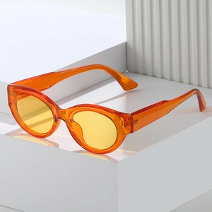 Lunettes de soleil œil-de-chat vintage avec monture orange et verres jaunes Y2K