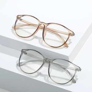 Retro TR90 oversized round anti-blue light glasses frames in champagne and transparent grey