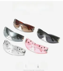 Detail of Y2K wraparound sunglasses featuring star patterns and metal star side accents