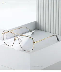 Detailed close-up of classic square metal frame glasses with a stylish double bridge design