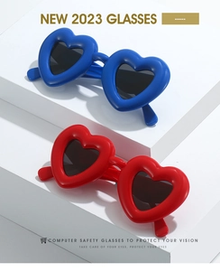 Macro shot of candy-colored heart-shaped safety glasses protecting eyes from blue light