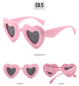 Three-view display of pink heart-shaped Y2K sunglasses with dark grey lenses and thick frame