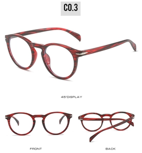 Three-view display of round retro glasses frame with red black marbled texture and silver arrow
