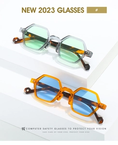 Close-up of polygon retro computer safety glasses with colorful frames and tortoise temples