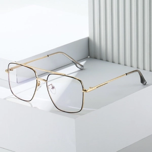 Classic gold metal double-bridge glasses with black trim and clear lenses for men and women