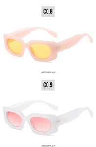 Detail view of square frame sunglasses in pink and transparent white from a 45-degree angle
