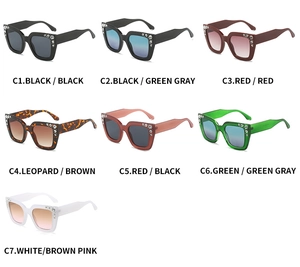 Detail showing oversized square sunglasses with sparkling rhinestone embellishments in seven colors