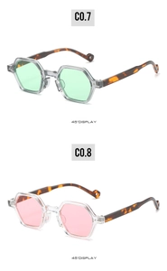 Detailed 45-degree view of polygonal sunglasses with green and pink lenses