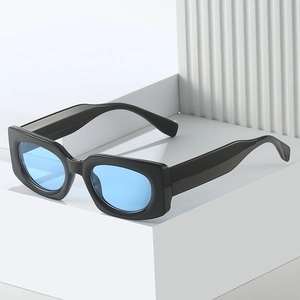 Chic vintage square sunglasses featuring glossy black frames and translucent blue lenses