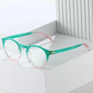 Classic round frame glasses with mint green and soft pink gradient finish and metal details