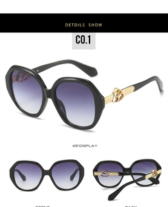 Three-way view of women's oval sunglasses with black frames and purple gradient lenses