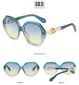 Detailed views of oval sunglasses with gradient lenses and gold metal temple accents