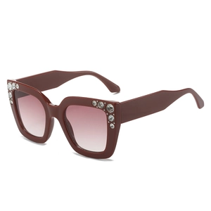 Burgundy square sunglasses for women with rhinestone accents and gradient lenses
