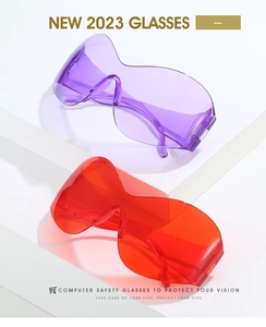 Detail view of oversized steampunk Y2k sunglasses in red and purple frameless design