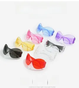 Detailed flat lay of oversized Y2K steampunk goggles in seven vibrant translucent colors