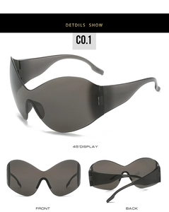Three-angle view of oversized Y2K steampunk sunglasses in translucent grey-black