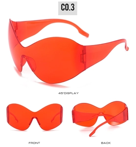 Three views of red Y2K steampunk oversized wrap around sports sunglasses for women