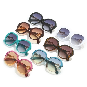 Oval oversized sunglasses set in multiple colors like tortoiseshell, black and gradients