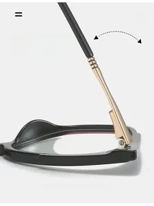 Detail of durable gold metal hinge on black TR90 frame with smooth folding design