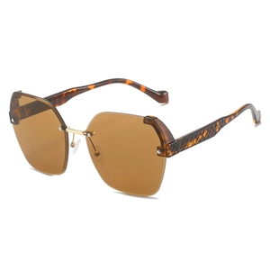 Fashion rimless oversized sunglasses with brown lenses and woven texture metal temples