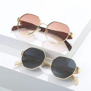 Lunettes de soleil octogonales en métal avec verres ronds vintage et monture dorée