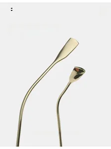 Polished gold metal temple detail of aviator sunglasses with ergonomic curved design