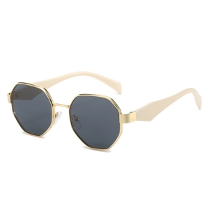 Lunettes de soleil polygonales en métal doré avec verres gris foncé et branches crème
