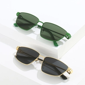 Stylish square sunglasses in green plastic and gold metal frames with black lenses