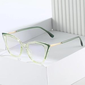 Stylish cat-eye TR90 frames in translucent light green with golden metal temples