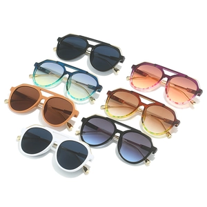 Collection of retro double bridge aviator sunglasses in various colors with UV400 lenses