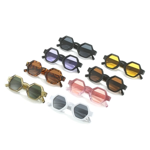 Eight pairs of stylish geometric hexagonal sunglasses in various trendy assorted colors