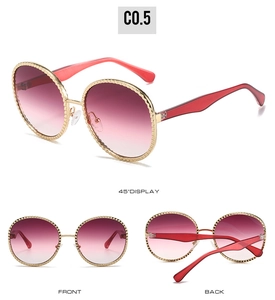 Vues multiples de lunettes de soleil ovales rétro avec monture dorée et verres dégradés roses