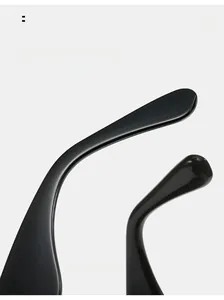 Detail of curved sunglasses legs featuring high-gloss resin and ergonomic comfort design