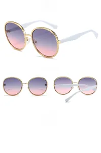 Vues détaillées des lunettes de soleil ovales avec monture dorée et verres dégradés