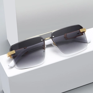 Oversized rimless square sunglasses with gradient grey lenses and gold metal accents