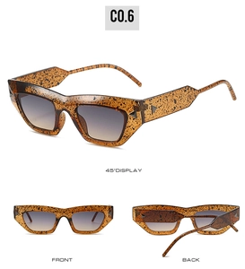 Viste dettagliate degli occhiali da sole vintage cat eye con montatura tartarugata e lenti sfumate