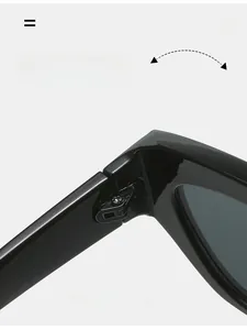 Detailed close-up of a durable metal hinge on stylish black cat-eye sunglasses