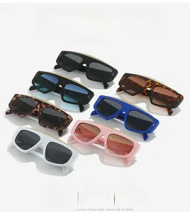 Detailed pile of large rectangular fashion sunglasses in various trendy vibrant colors