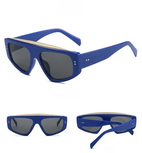 Flat top oversized blue sunglasses with gold metal trim in front, back and 45 degree views