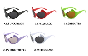 Flat lay of y2k devil horn sunglasses in black, red, green, purple and white