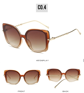 Detailansichten der Cat-Eye-Sonnenbrille mit Bernsteinrahmen und goldfarbenen Bügeln