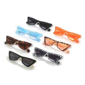 Modern triangular geometric sunglasses set with colorful retro frames and thick cat-eye design