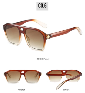 Detail view of double bridge square sunglasses with brown gradient frames and metal accents