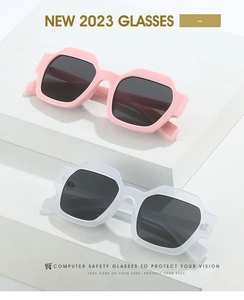 Detail of pink and white hexagonal chunky frames for trendy 2023 outdoor sunglasses