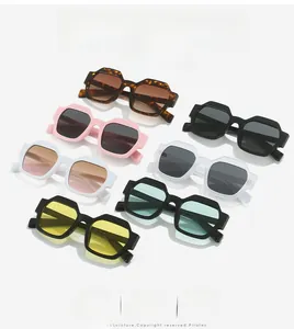 Detailed grid of geometric thick-frame sunglasses in multiple vibrant colors and finishes