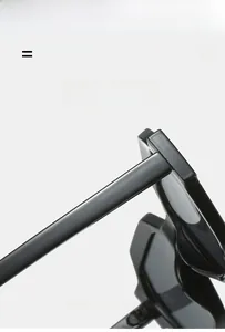 Macro detail of glossy black sunglasses frame with super elastic hinge and texture material